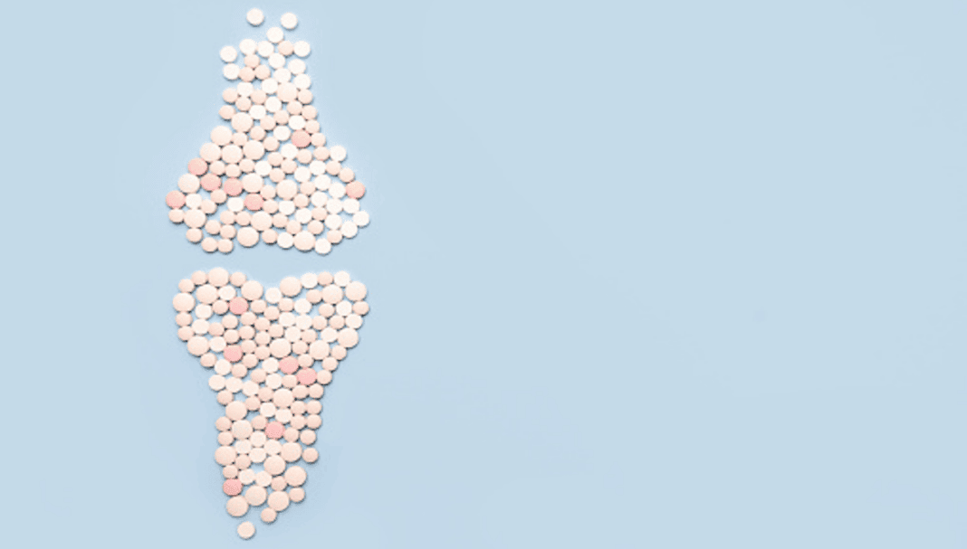 gettyimages-1446012225-170667a Pills shaped like bones, representing calcium and vitamin D premenopause support