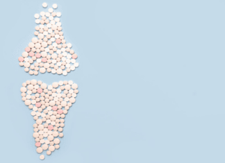 Calcium and Vitamin D for premenopause Pills shaped like bones, representing calcium and vitamin D premenopause support