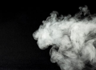 Huge change to vaping laws to smash recreational use White vapor smoke against a black background, illustrating vaping in the context of vaping laws changes