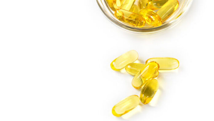 gettyimages-1335046227-170667a Fish oil capsules representing appropriate fish oil dosage for therapeutic use