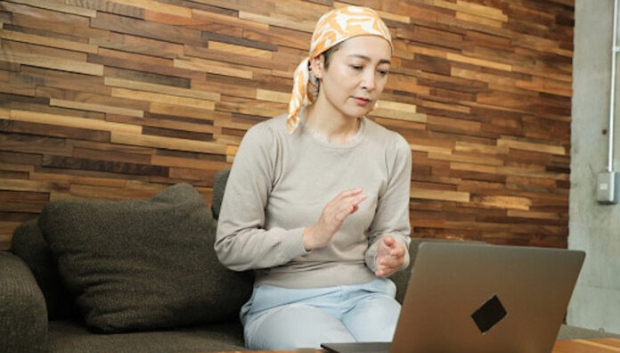 Female patient and doctor implement online medicine. Patient discussing medication with hospital pharmacist during care transition