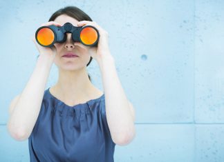 New ECP Director to focus on the future woman holding binoculars