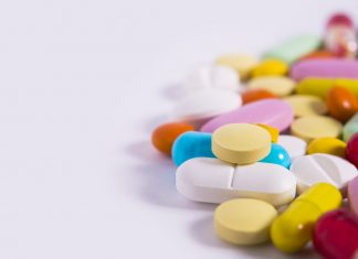Medication management in older Australians pile of pills with different shapes and colours