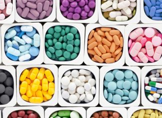 Australians’ understanding of their medicines falls short colourful medications sorted into cups