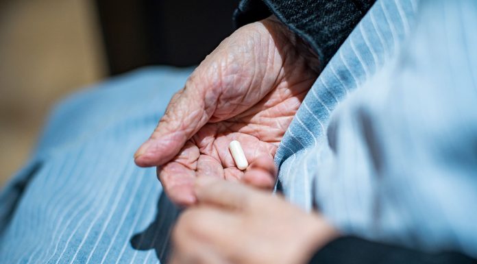 Embedding pharmacists in RACFs an investment, not a cost Theresa Flavin, a 57-year-old mother of five, was diagnosed with dementia at just 46. She says RACFs need a pharmacist ‘on the team’.