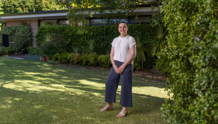 PIC_5593 Consultant pharmacist Dr Manya Angley standing outdoors, reflecting her role in community health