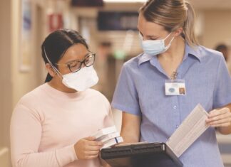 Aiming for zero medicine harm Pharmacist explaining medication information