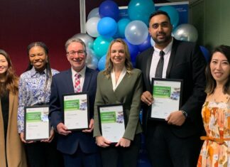 Four outstanding WA pharmacists celebrated Four outstanding WA pharmacists holding awards, standing with two colleagues at a celebration event