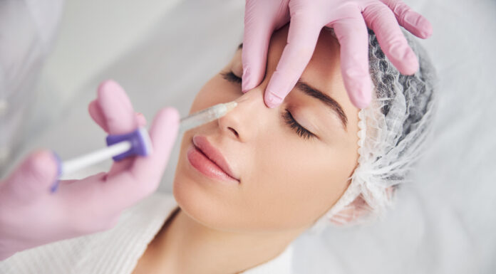Are pharmacists the next cosmetic injectors? Calm female patient undergoing injectable beauty procedure