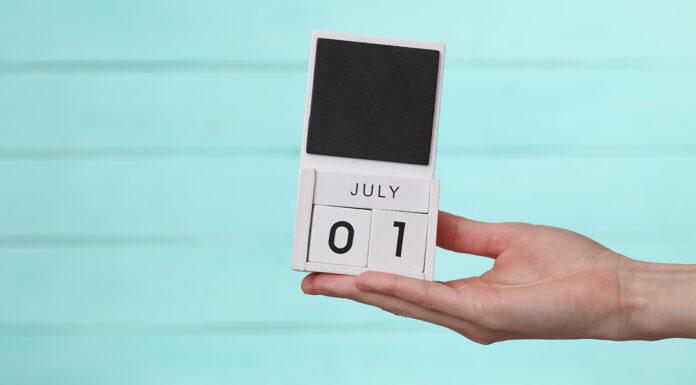 Mid-year pharmacy policy overhaul begins Hand holding a calendar showing July 1, marking the start of the pharmacy policy overhaul