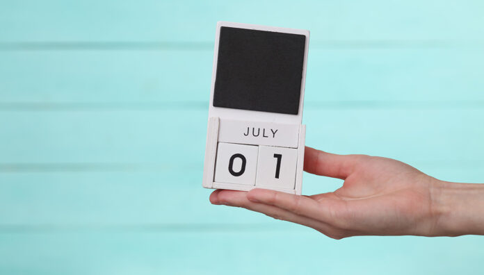 GettyImages-1492680492_WEB Hand holding a calendar showing July 1, marking the start of the pharmacy policy overhaul