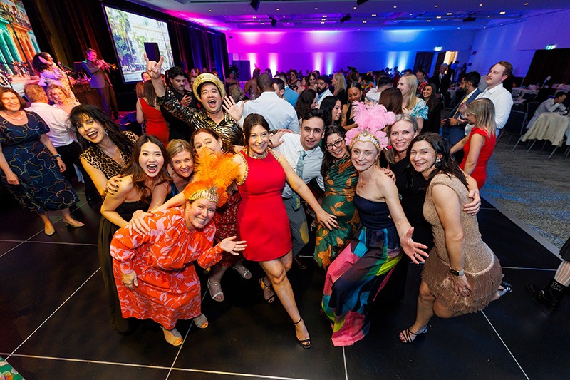 Large group dancing at PSA’s most successful conference
