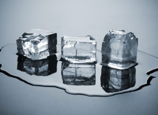 three melting ice cubes