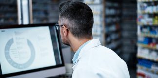 pharmacist using a computer