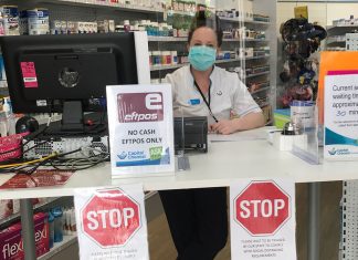 A triage desk at Capital Chemist Southlands prevents customers from entering the pharmacy