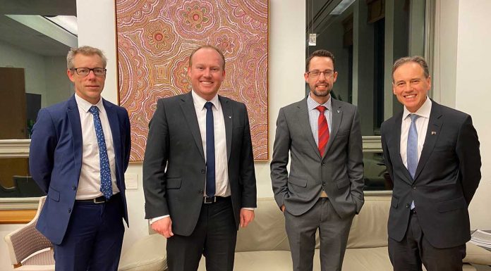 PSA's lead 7CPA negotiator Dr Shane Jackson, CEO Mark Kinsella and National President Associate Professor Chris Freeman with Federal Health Minister Greg Hunt.