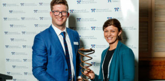 Bridget Totterman MPS (right) receives her award from PSA Queensland Branch President Shane MacDonald