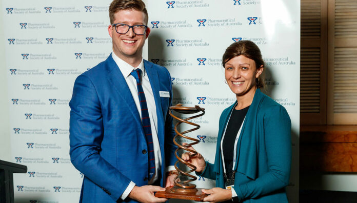 Bridget Totterman MPS (right) receives her award from PSA Queensland Branch President Shane MacDonald