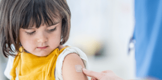 Managing pain and fever associated with childhood vaccination