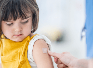Managing pain and fever associated with childhood vaccination